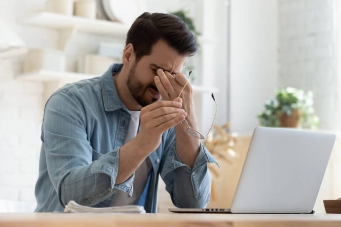 man stressed because of an occupational hazard